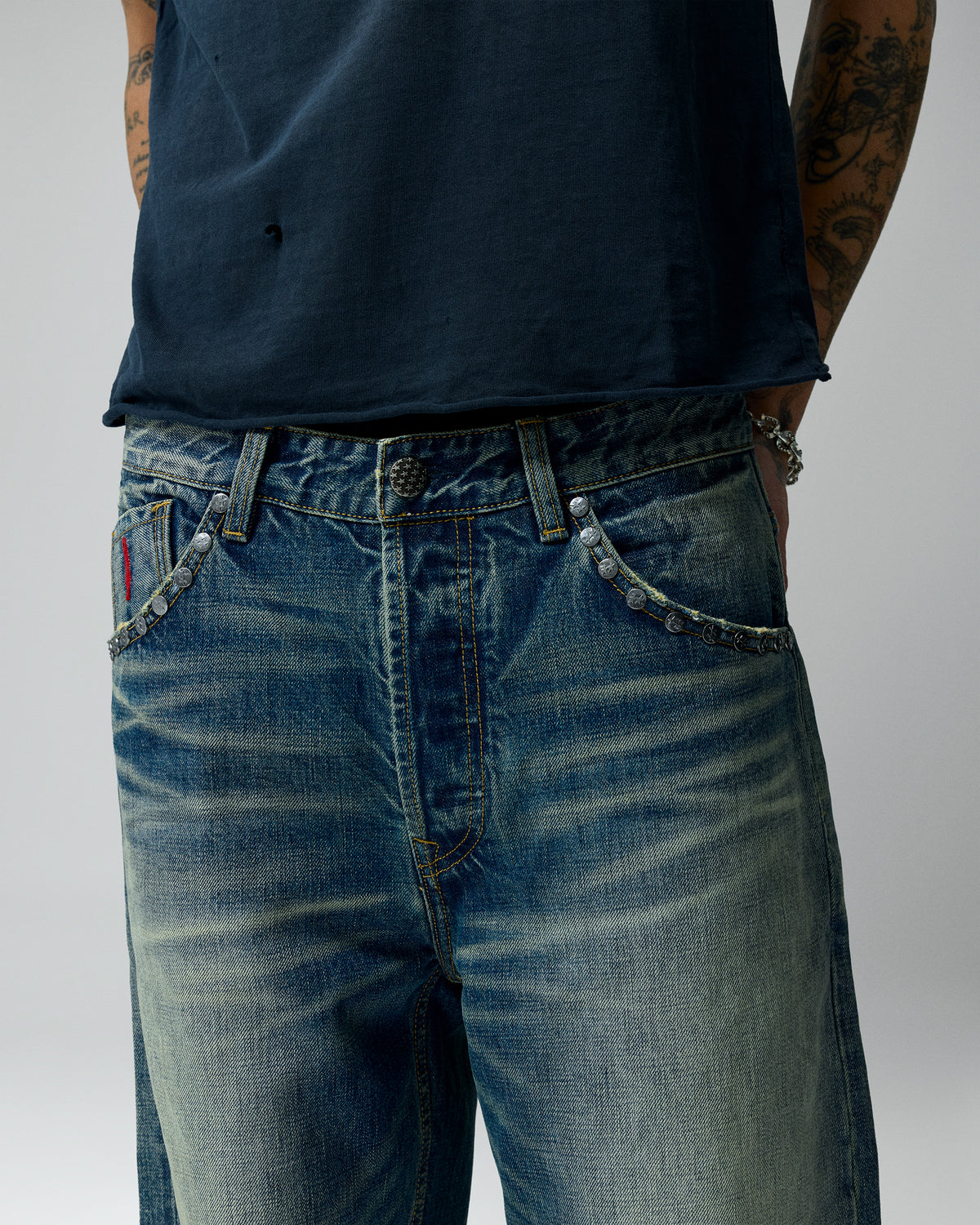 Straight Studded Medium Wash Denim Pants – worn by model