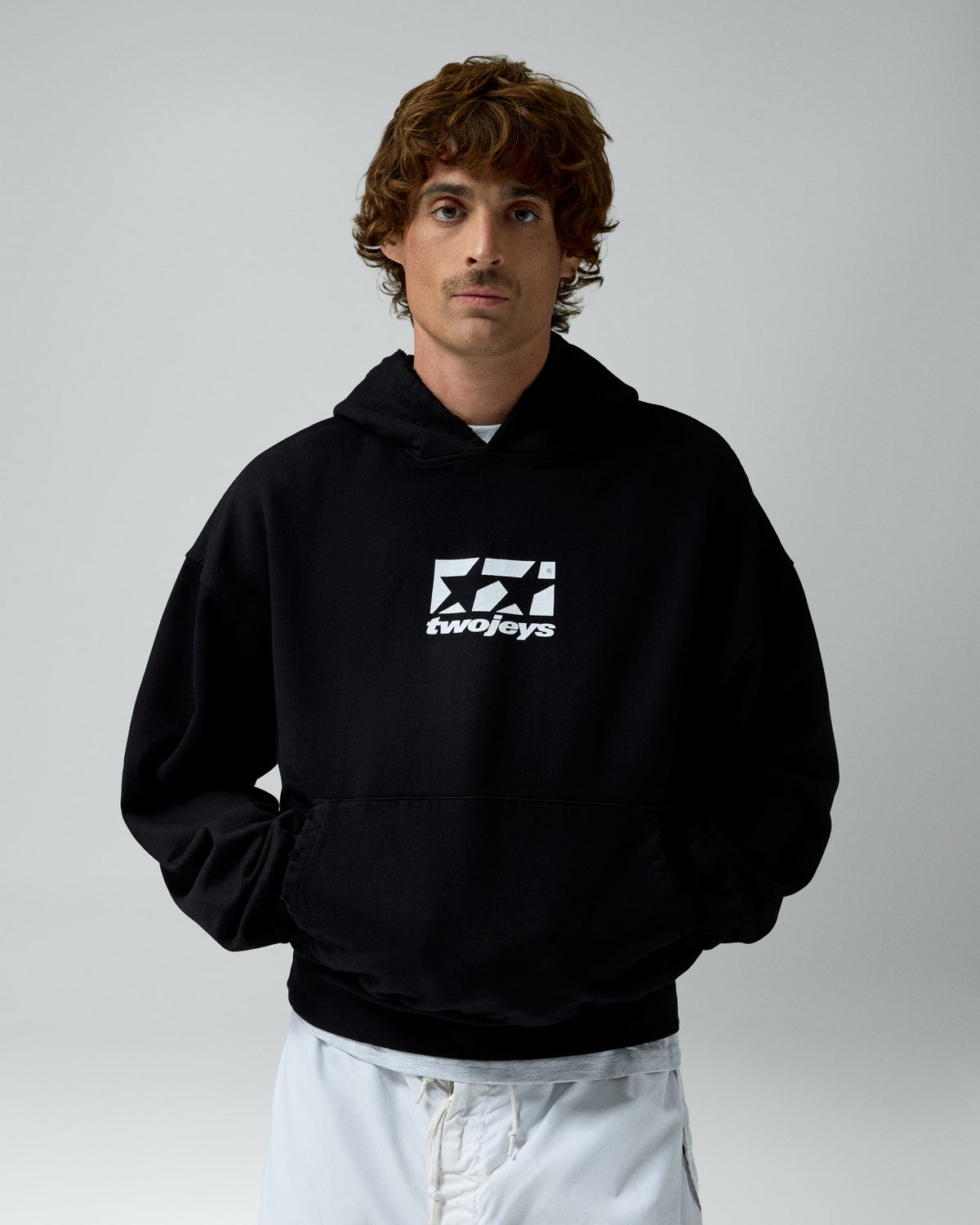 Framed Logo Hoodie Black – worn by model