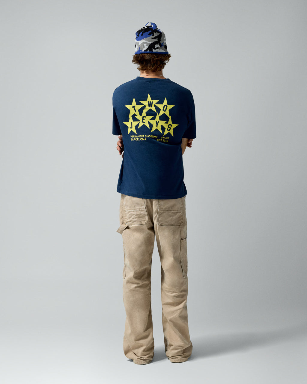Permanent Shooting Stars Tee Navy – worn by model