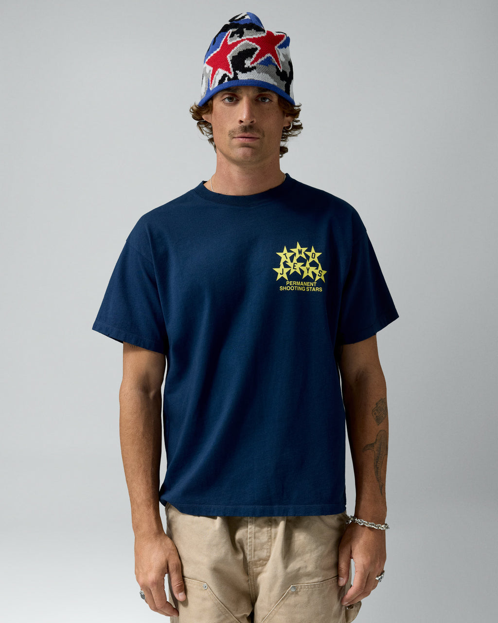 Permanent Shooting Stars Tee Navy – worn by model