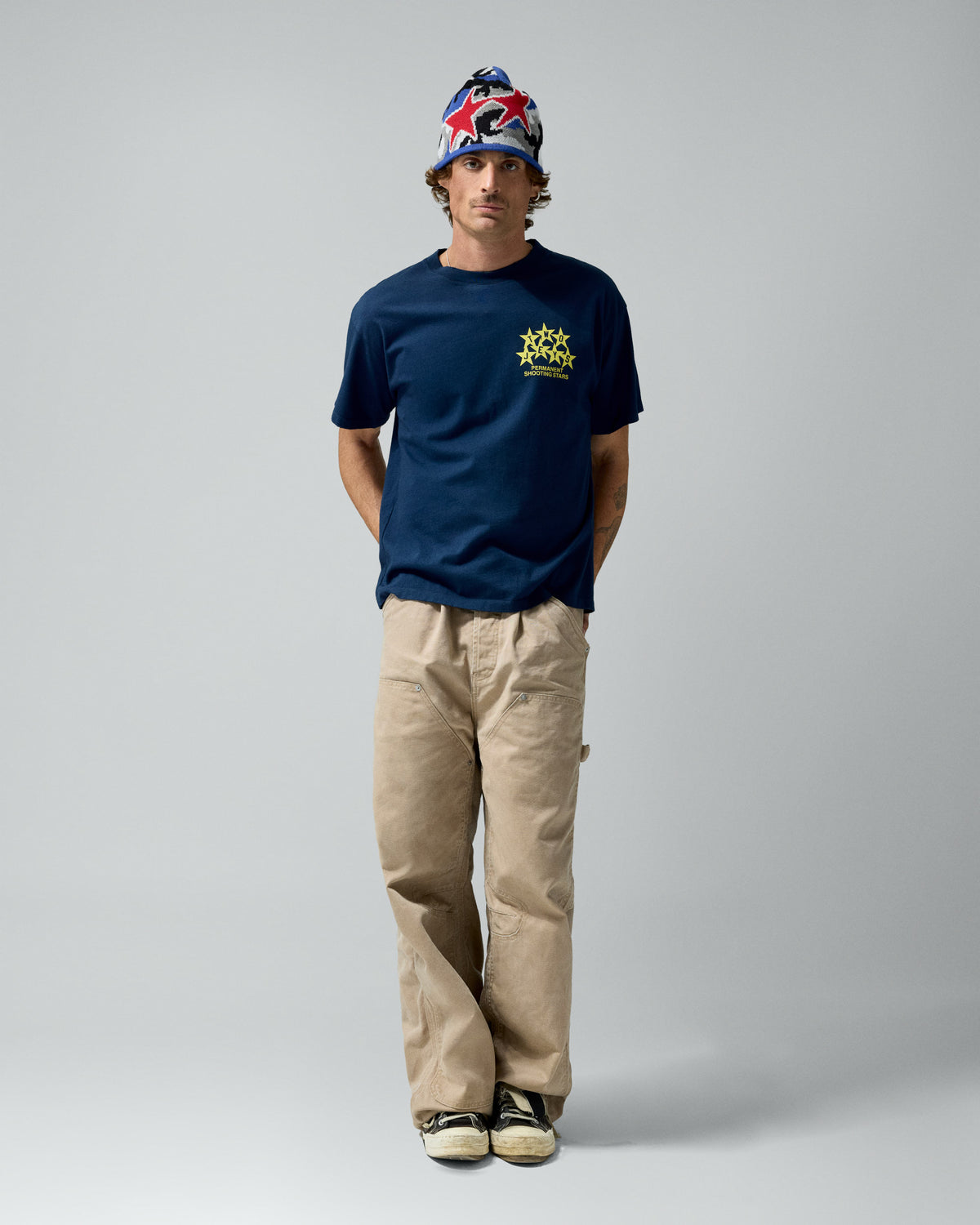 Permanent Shooting Stars Tee Navy – worn by model