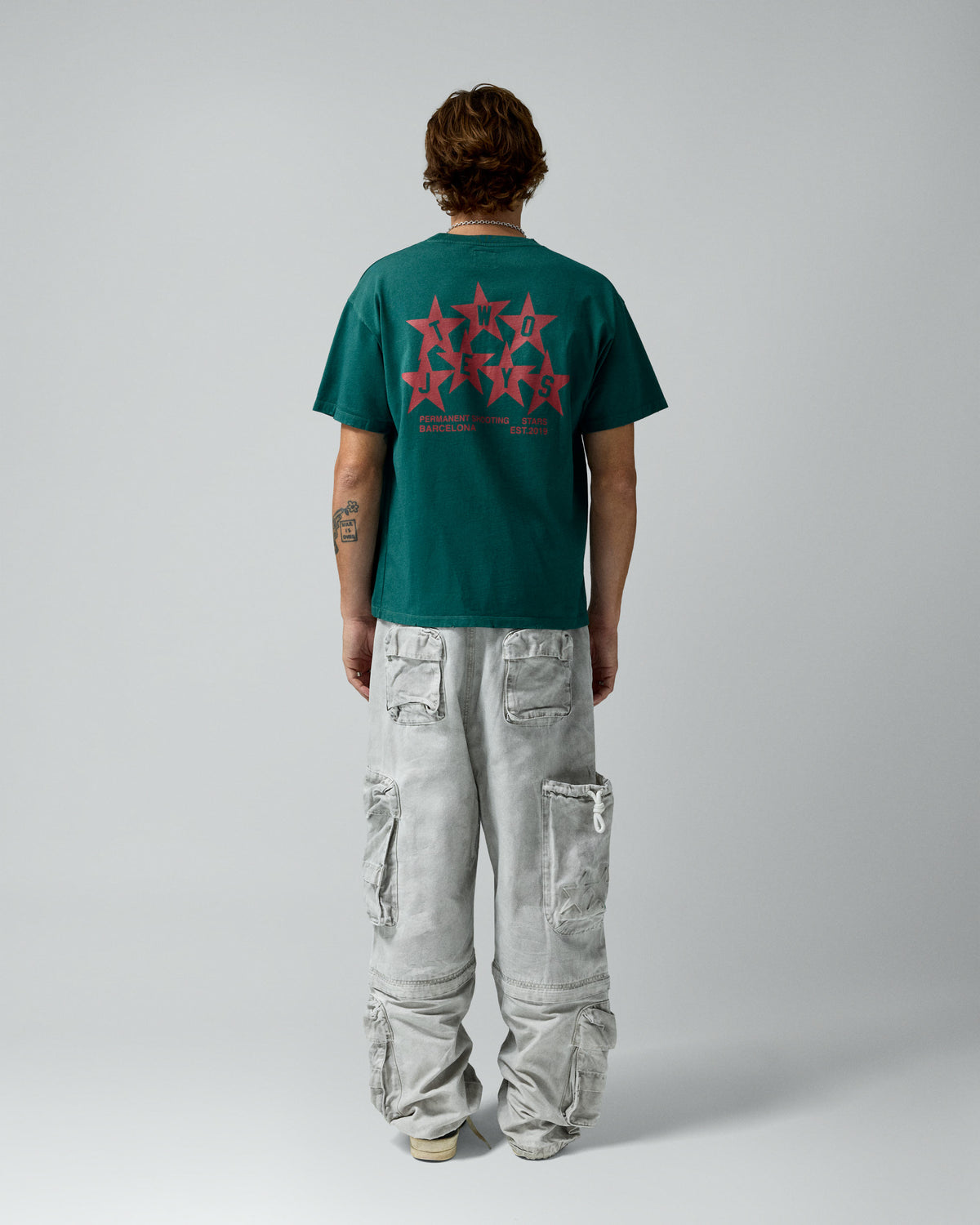 Permanent Shooting Stars Tee Pine Green – worn by model