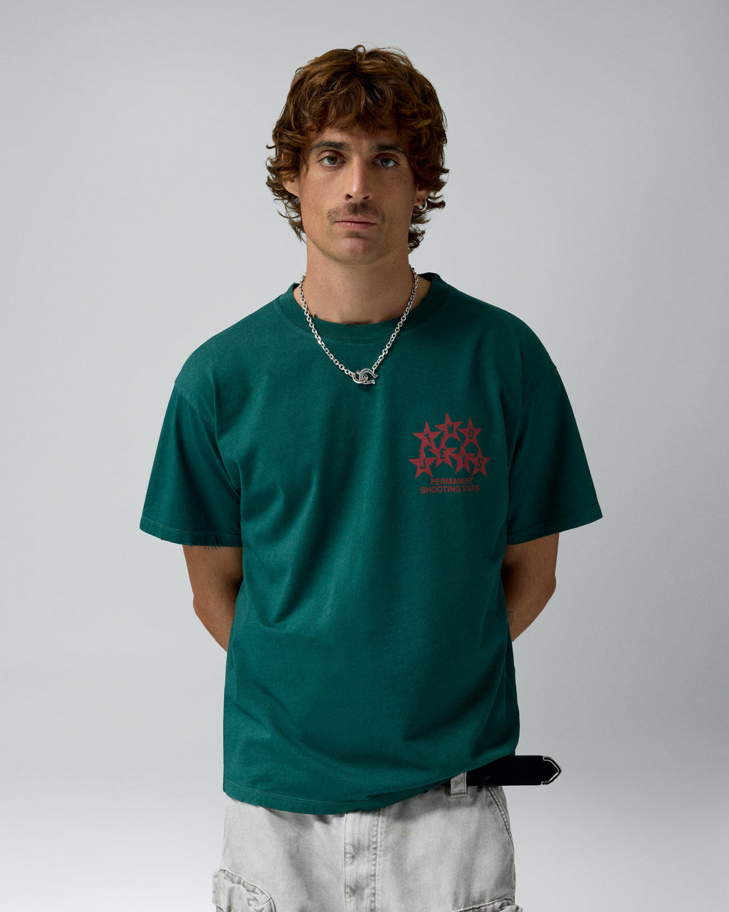Permanent Shooting Stars Tee Pine Green – worn by model